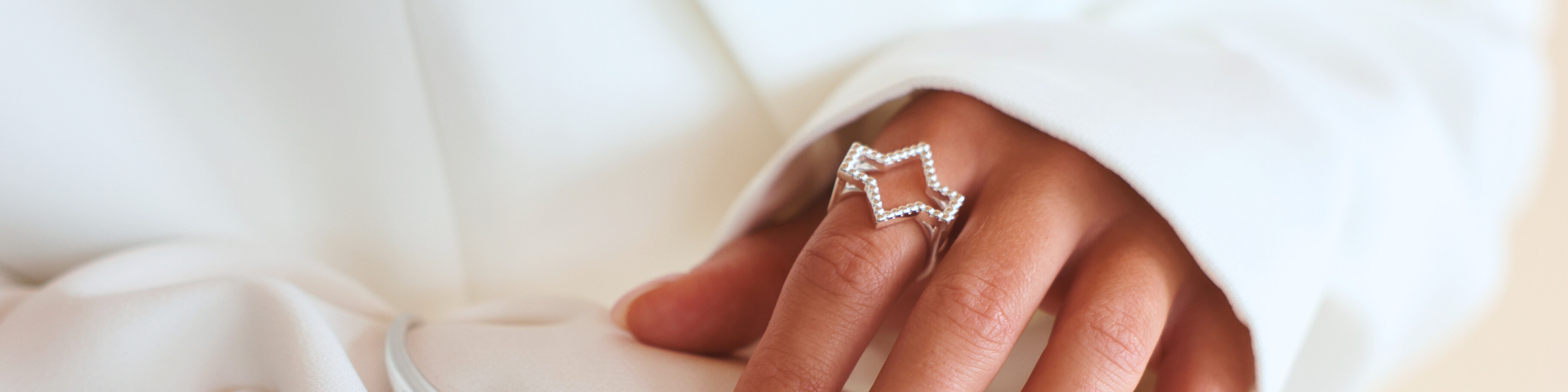 Starlite collection of 18k gold and .925 silver star shaped