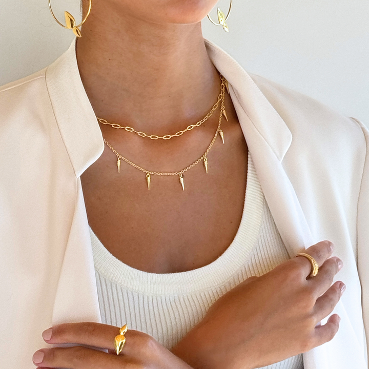 Horn 18k gold vermeil necklace with small charms