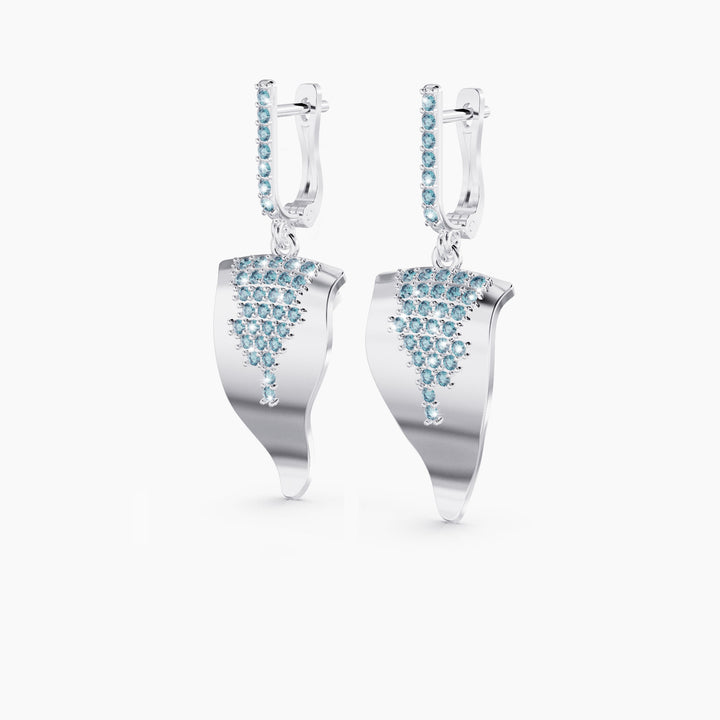Echo silver huggie earrings with blue CZ stones