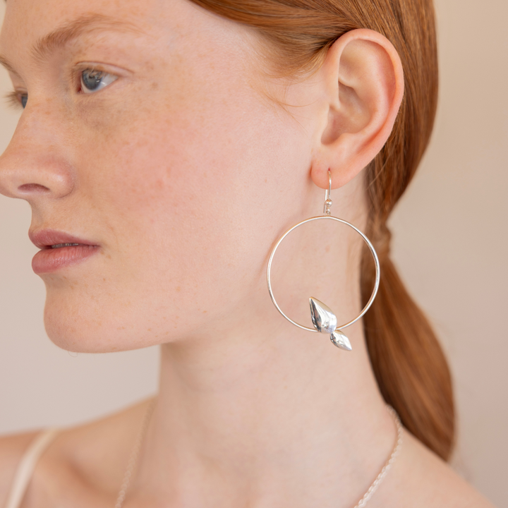 Lotus silver hoop earring