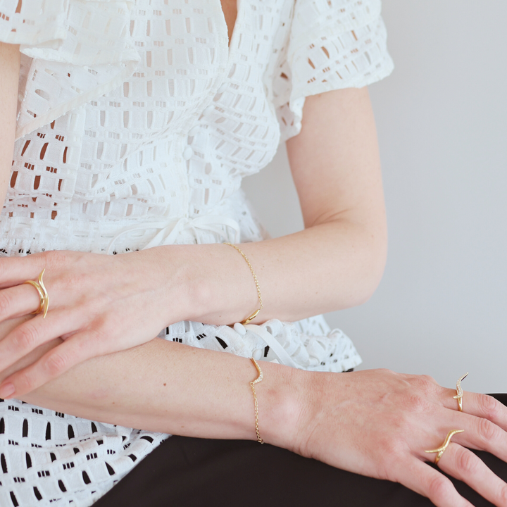 Swirl 18k gold vermeil bracelet with clear cz