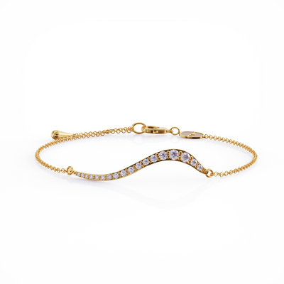 Swirl bracelet 18k gold with clear cz