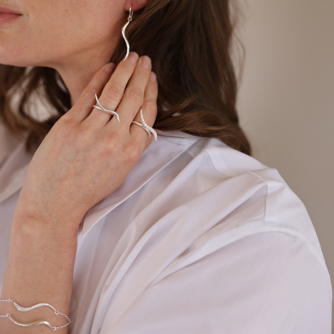 Swirl silver bracelet with clear cz