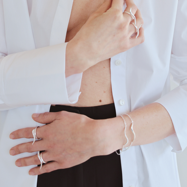 Swirl silver bracelet with clear cz