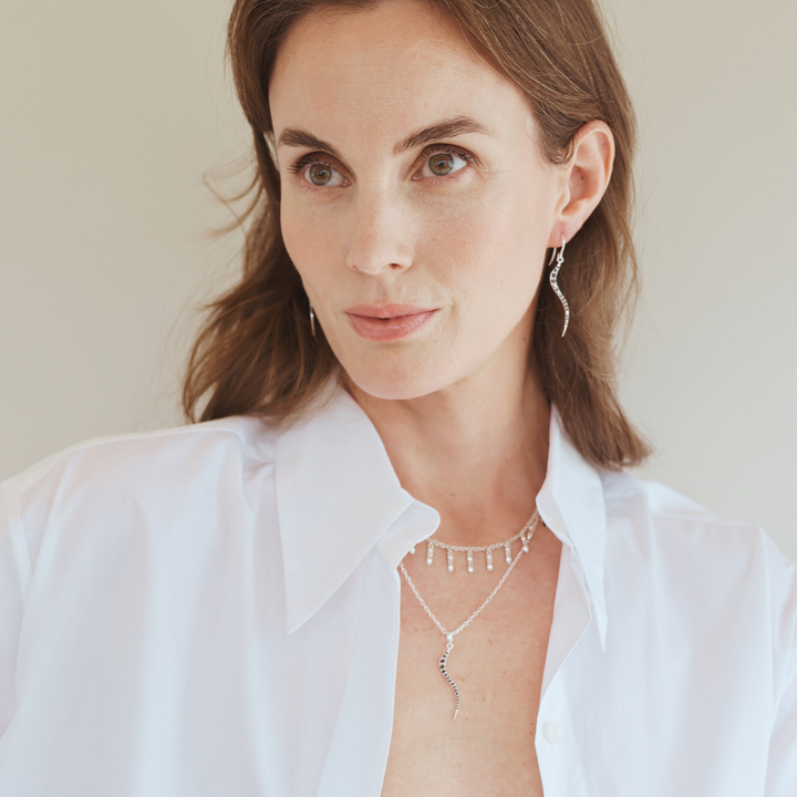 Swirl silver necklace with onyx cz